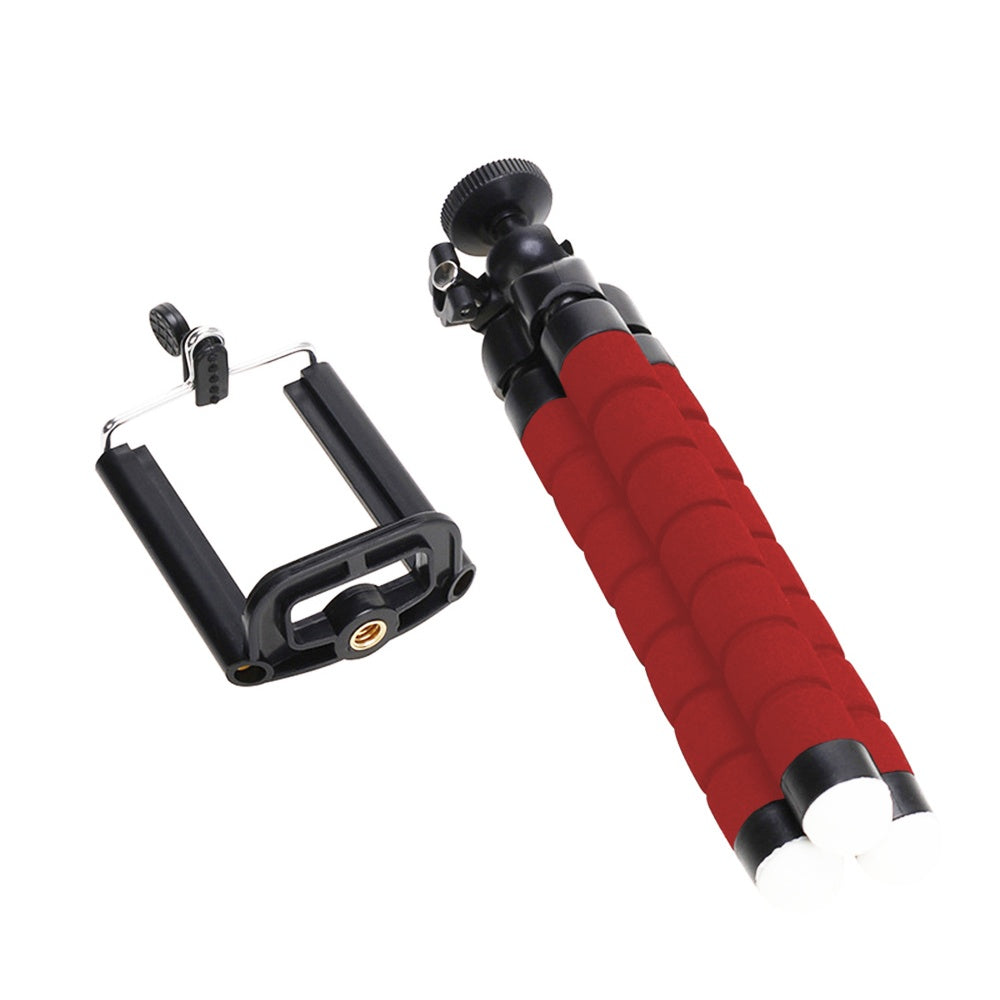 Red and black handheld camera stabiliser on a white background