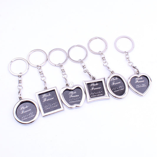 Set of photo frame keychains on a white background