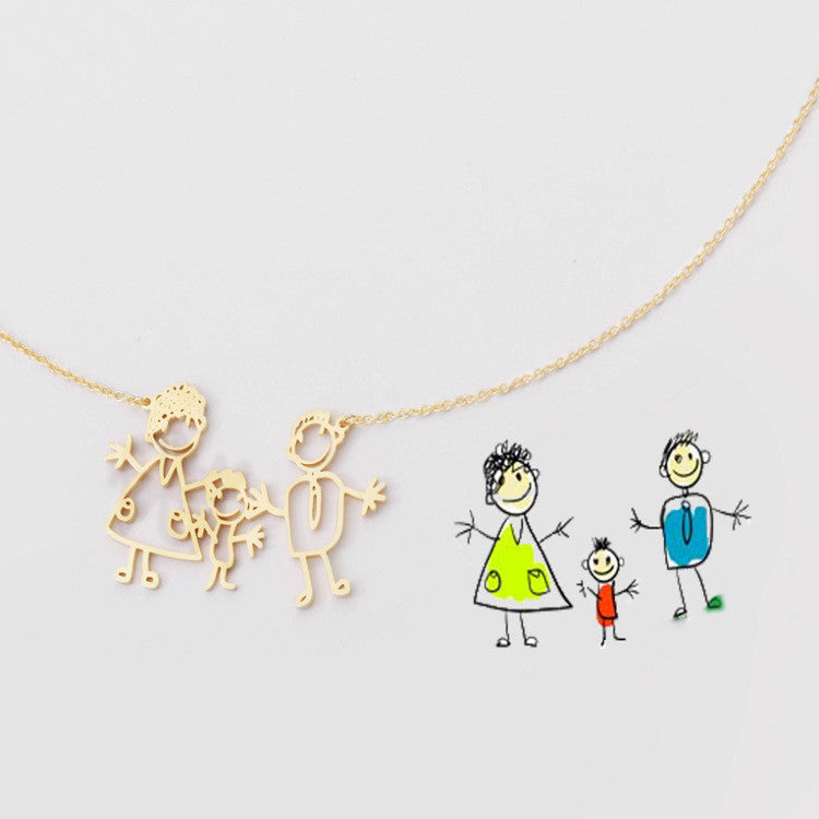 Gold necklace with stick figure family pendant on a light grey background
