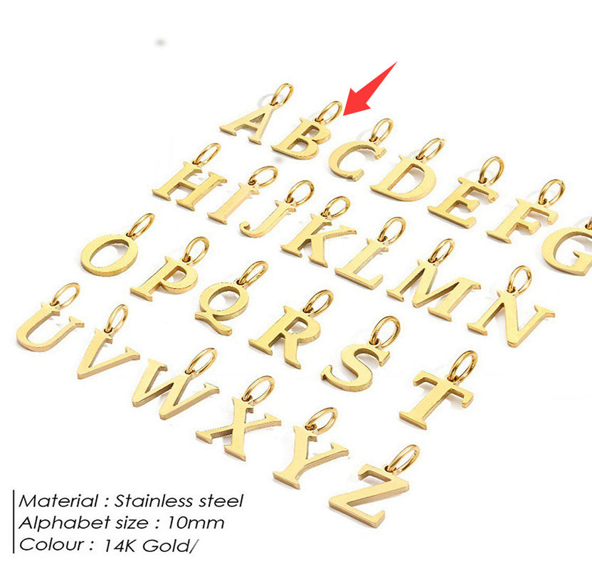 Gold letter pendants for a personalised necklace on a white background with a red arrow pointing to 'B'.