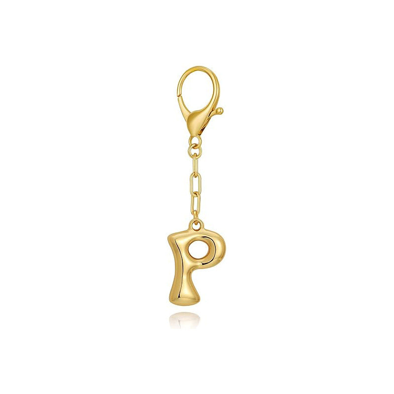 Gold letter 'P' keychain with clasp on a white background