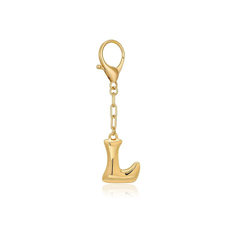Gold letter 'L' keychain with clasp on a white background