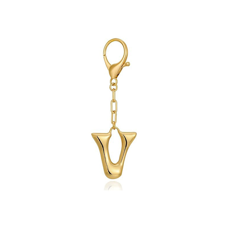 Gold letter 'V' keychain with clasp on a white background