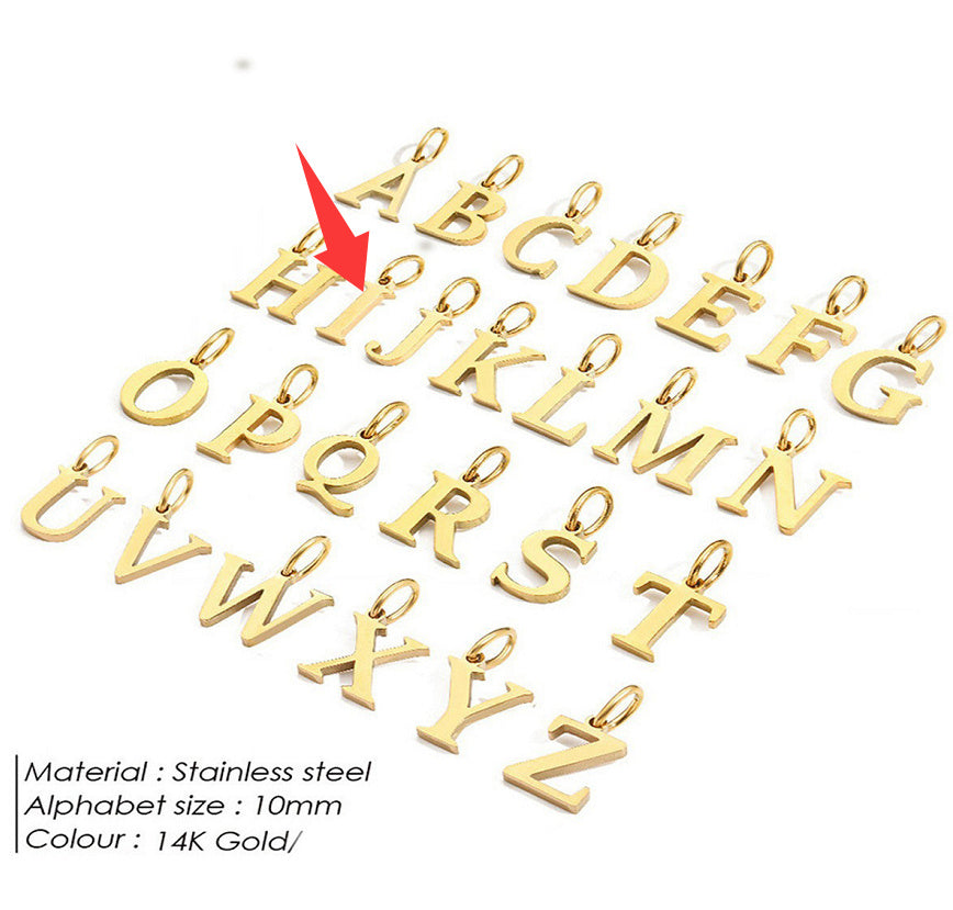 Gold letter pendants for a personalised necklace on a white background with a red arrow pointing to 'I'.